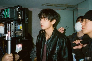 V.