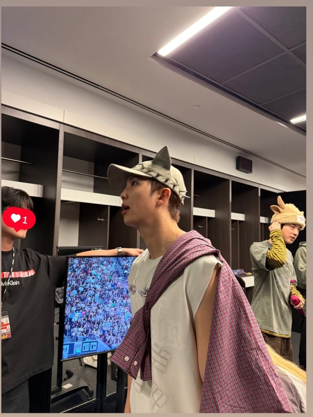 BTS RM wearing a cat ear hat and taking a selfie Its an emotional autobahn