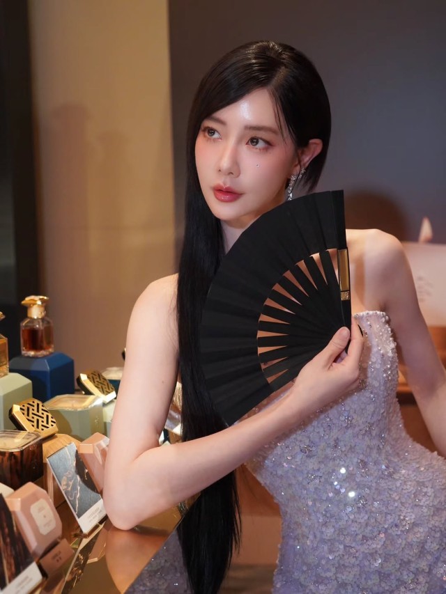 Clara attends perfume brand event in a light pink dress... "A magical ...