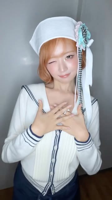 IVE レイ、オレンジの髪でウィンクポーズ...愛らしい魅力を放つ