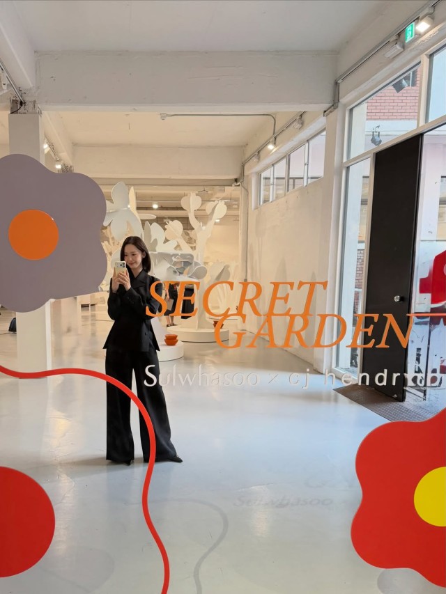 Yoona displaying elegant grace amidst dazzling floral decorations Exploding with sophisticated charm