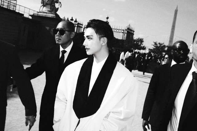 SKZs Hyunjin shows unique aura at Paris Dior collection White  Black classic look